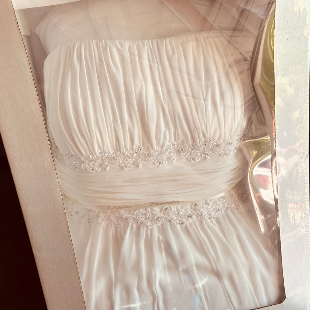 Elegant White Strapless Dress with Beaded Details